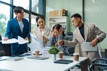 Stressed business person in a demanding career struggles with emotional burnout, overwhelmed by tasks and deadlines. exhausted and frustrated, seeking moment of relief amid her challenging workload.