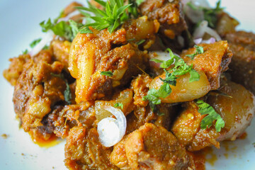 Pork curry. Dry pork curry cooking  with spices and herbs.