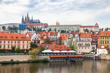 Obraz premium View of the Vltava Riverbank and Prague Castle. Panorama of Historic Prague, Czech Republic