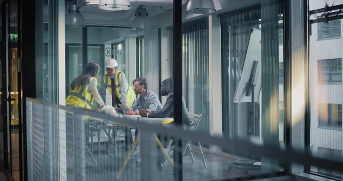 Meeting in an Architectural Bureau: Investment Strategist and a Financial Planner Having a Conversation with an Architect and a Civil Engineer About a New Construction Project in a Business District