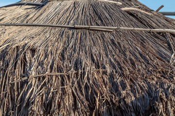 Fototapeta premium The roof texture is made of woven straw