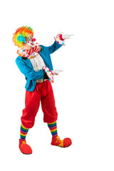 Funny clown pointing at blank template copy spase for advertising, posters, greetings, invitations. Entertainer as Joker in a suit and wig, with clown whiteface makeup.
