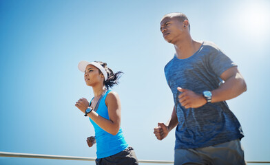 Fototapeta premium Running, cardio and couple with fitness, training and routine for wellness, support and workout. Outdoor, people or runners with woman, man or health with balance, exercise or breathing for body care