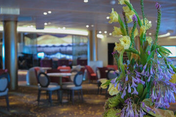 Modern design ballroom dancing lounge bar with seating, tables and dance floor with big band stage onboard luxury ocean liner cruiseship cruise ship traditional entertainment