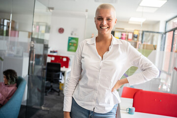 	
In her college office, a determined female student stands confidently, a beacon of empowerment...