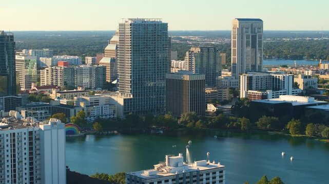 Orlando, Florida. American city downtown architecture with Lake Eola Park and high-rise office buildings. Real estate development in Florida. USA travel destination