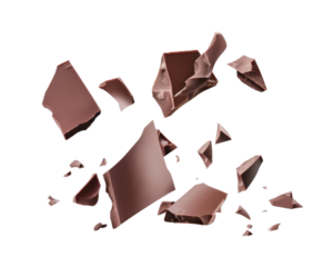 Broken pieces of chocolate scattered on a surface.