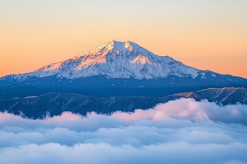 Beautiful snow capped mountain with sea of clouds during sunrise 