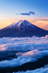 Beautiful snow capped mountain with sea of clouds during sunrise 
