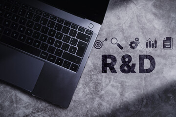 Top view laptop on desk with Research and Development concept. Use PC for research and development...