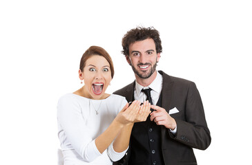 Portrait of an excited couple receiving great news on cellphone 