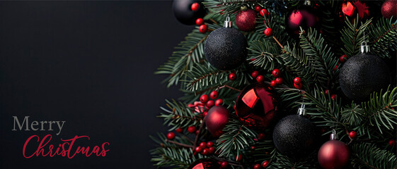 Merry Christmas celebration holiday background greeting card, branch with black and red baubles isolated on dark background