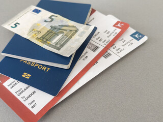 Euro, Passport and air tickets on a black background. mockup empty blank, copy space.