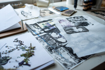 Gel printing with acrylic paint. Printing of plants, leaves and flowers on paper