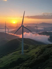 Scenic view of wind turbines at sunrise, surrounded by misty hills, showcasing renewable energy and nature's beauty.