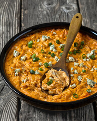 hot buffalo chicken dip in baking dish, top view