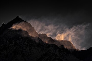 Spiti Valley in India. Himalaya mountain range, aerial view on the hill, Ladakh in India. Asia mountain Himalayas, blue winter landscape with rocky hill a snow range. Wild nature in India.