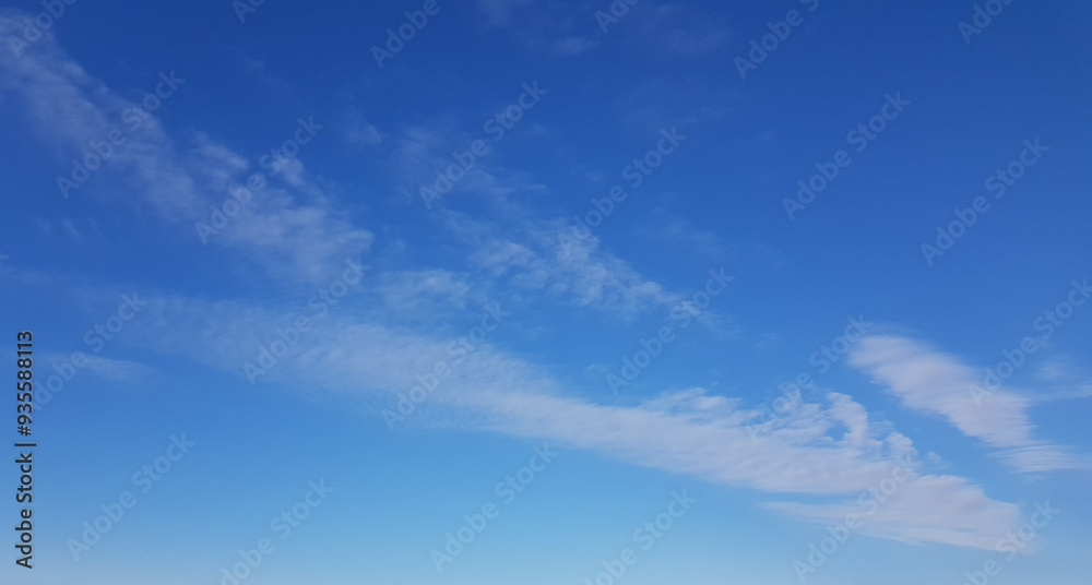Wall mural perfect blue sunny sky background. sky with little cloud and copy space