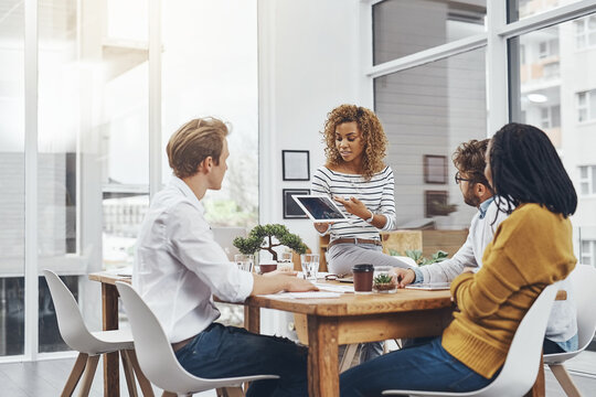 Business people, collaboration and planning in meeting, tablet and brainstorming with design company. Group, employees and startup with feedback for project, cooperation and professional with review