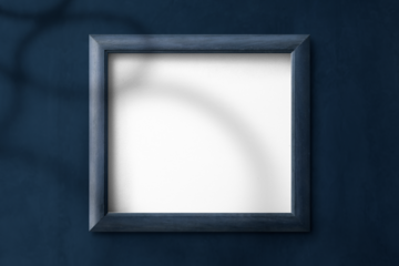 Blue picture frame mockup on a navy blue background