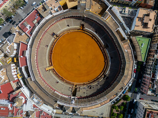 Obraz premium Aerial View of Seville's Iconic Bullring and Surroundings