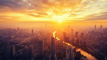 Obraz premium A golden sunset over a city skyline, with the buildings glowing in the evening light
