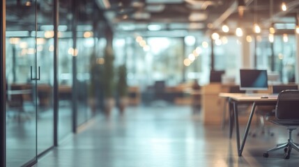 Modern office interior with bright lighting and desks in a spacious coworking space during the day