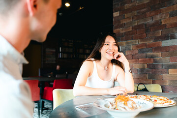 Coworker couple having lunch together