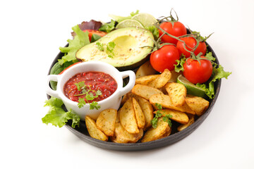 crispy fried wedges of potato with vegetable salad and sauce