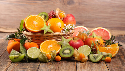 fresh fruits on wood background