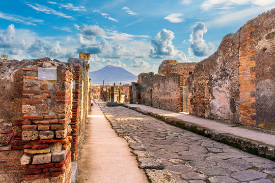 beautiful landscape from Pompeii ancient archeological excavation to Vesuvius volcano  and amazing cloudy cky on background