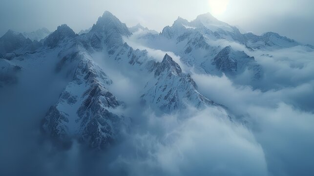 Snow-capped mountains rise through thick clouds, creating a breathtaking and serene landscape, Ideal for use in travel promotions, nature blogs, or adventurous themed marketing materials,