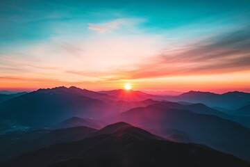 Obraz premium A breathtaking sunrise over a mountain range, illuminating the sky with vibrant colors and casting long shadows across the rugged landscape. A perfect capture of natural beauty.