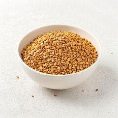 Wooden spoon with psyllium seed husk, isolated on white background