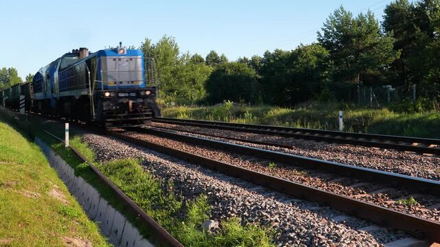 train running on industrial tracks railway freight wagons