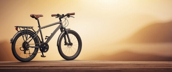 Obraz premium A grey bicycle on a wooden surface against a blurred orange background