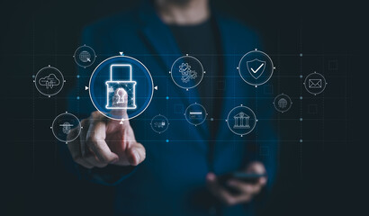Cybersecurity management, Data protection concept. Businessman interacts with digital interface focusing on cyber security management and data protection with icons lock, shield, and cloud security.