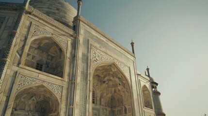 Taj Mahal in India Capture the building's beautiful white marble and intricate inlays. It is a clear example of Mughal architecture.