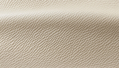 Obraz premium Close-up of beige leather with a textured surface.