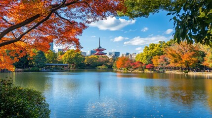 Ueno Park's autumn scenery features Lotus Lake and Shinobazunoike Benten-do Temple, renowned landmarks in Tokyo's Ueno district.