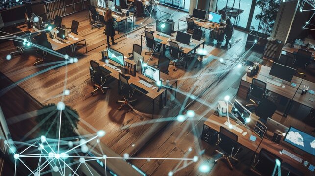 A modern office with several workstations connected by glowing network lines, evoking a sense of high-tech connectivity and collaboration.