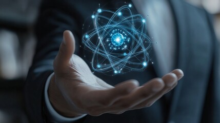 Hand Holding Atomic Model.