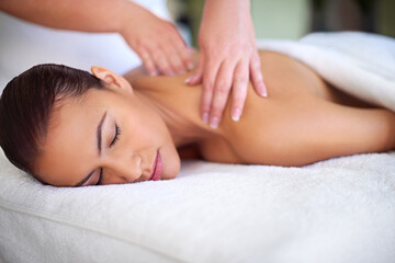 Woman, resting or hands on back to massage for body circulation treatment, pamper or muscle recovery. Calm, relax or masseuse for soothing therapy, holistic healing or detox service at beauty spa