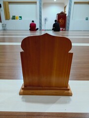 Sutrah, a wooden object used by moslems when performing salat (prayers) as a barrier between themselves and anyone passing in front of them