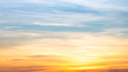 Beautiful , luxury soft gradient orange gold clouds and sunlight on the blue sky perfect for the...