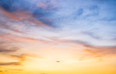 Beautiful , luxury soft gradient orange gold clouds and sunlight on the blue sky perfect for the background, take in everning,Twilight, Large size, high definition landscape photo