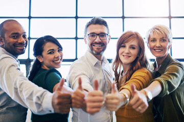 Office, diversity and portrait of business people with thumbs up for teamwork, creative collaboration or solidarity. Men, women and yes hand gesture for support, agreement or success at design agency