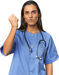 Hispanic nurse in uniform with stethoscope showing fist to camera, aggressive facial expression.