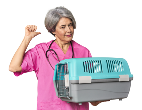 Caucasian mid-age vet holding pet carrier feels proud and self confident, example to follow.