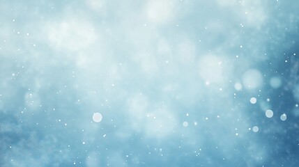 Fototapeta premium Soft blue bokeh background with light particles, a dreamy and delicate backdrop for artistic and festive themes